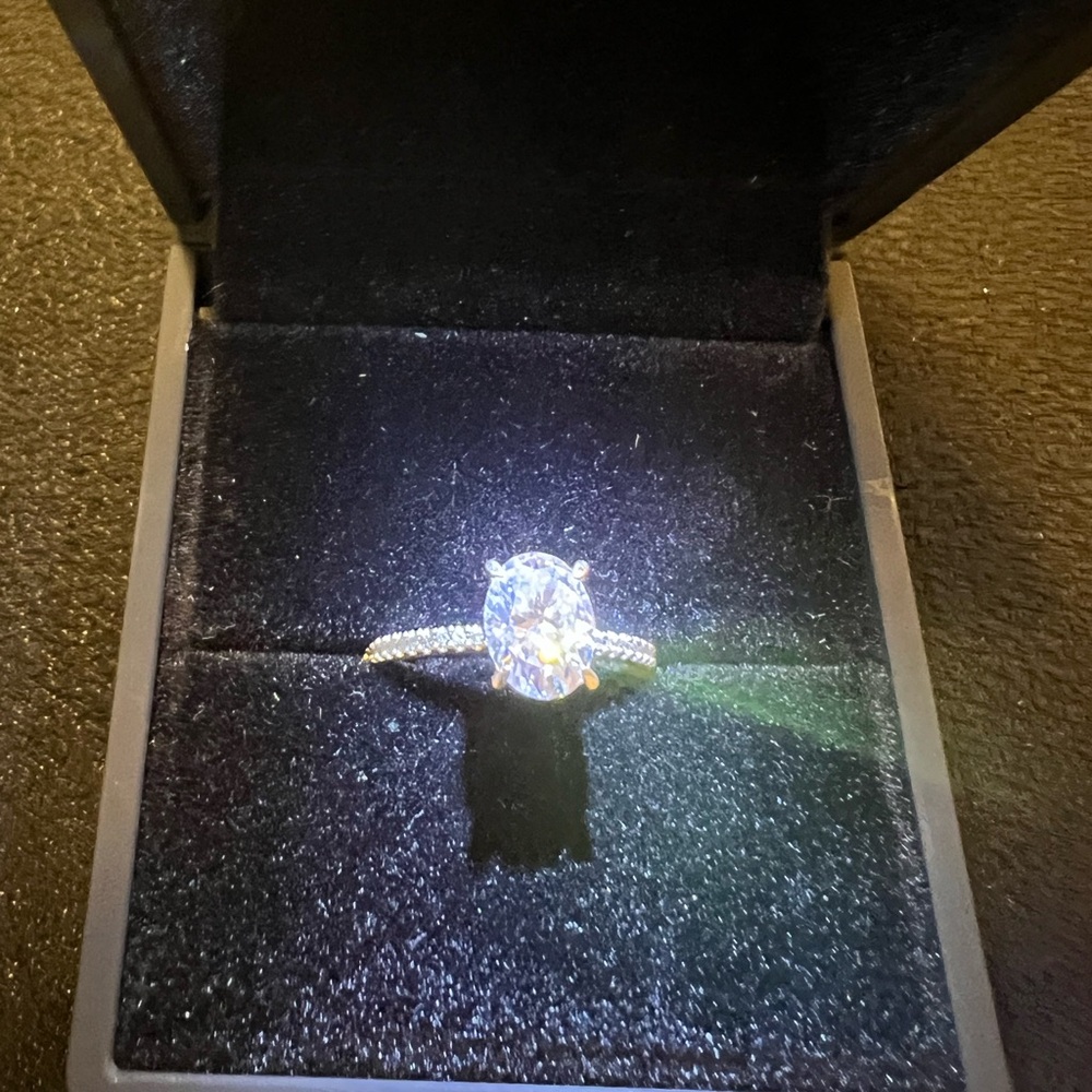 Dazzling white gold Mossianite and Diamond engagement ring.
